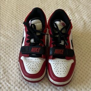 Nike Kids Red and White Sneakers with Black Accents